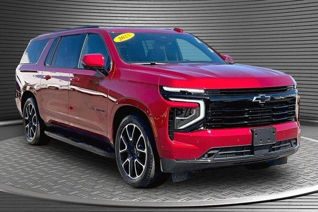 2025 Chevrolet Suburban RST in Radiant Red Tintcoat — front three-quarter view