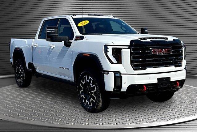 2024 GMC Sierra 2500 HD AT4 in Summit White — front three-quarter view