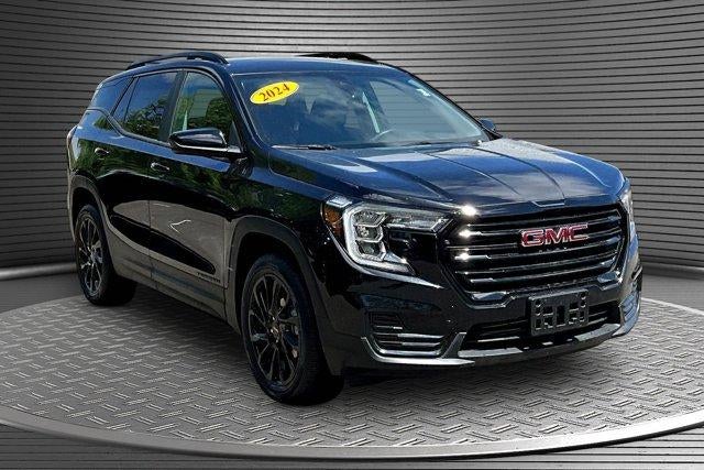 2024 GMC Terrain SLE in Ebony Twilight Metallic — front three-quarter view
