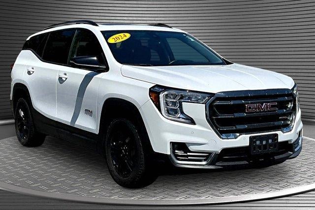 2024 GMC Terrain AT4 in Summit White — front three-quarter view