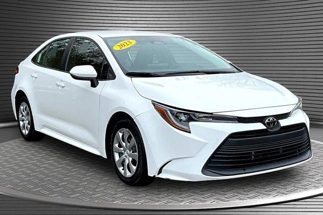 2023 Toyota Corolla LE in White — front three-quarter view