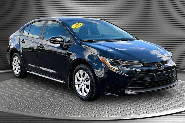 2026 Toyota Corolla LE in Black — front three-quarter view