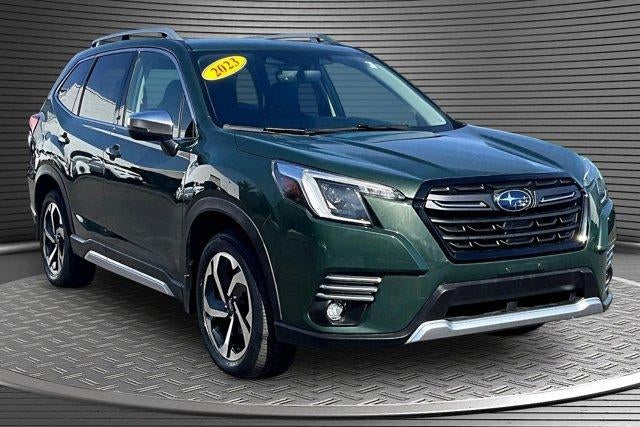 2023 Subaru Forester Touring in Green — front three-quarter view